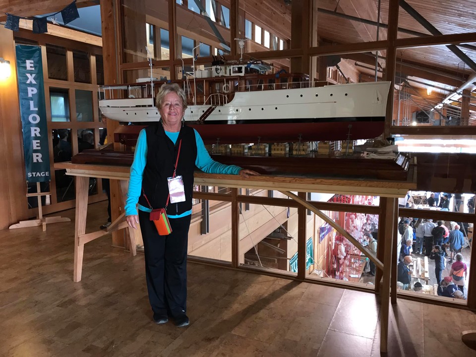 Former Olympus owner Diane Lander, with Olympus model. [Brenda Ellis photo 9-6-19]